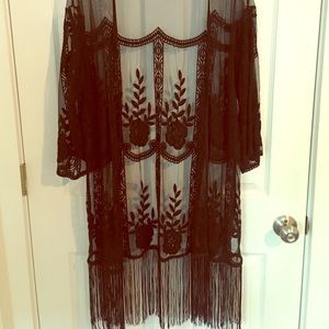 Sheer black lacy cover up. Brand new- never worn.